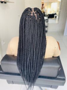 Side-by-side comparison of Knotless Braids and Box Braids on natural hair.