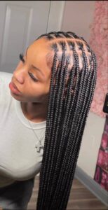 Close-up of Knotless Braids showing natural-looking roots and lightweight protective styling