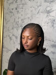 Professional sew in hairstyle by Braids by Dorine